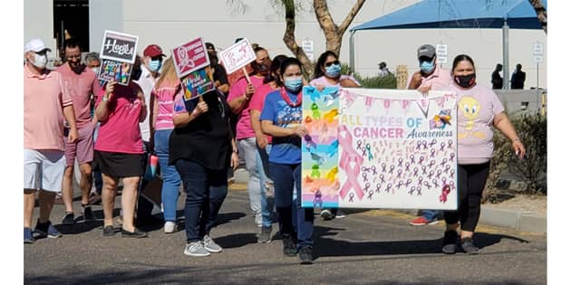 Legends had their 2nd annual Cancer Walk with approximately 75 employees supporting the cause by wearing pink, walking behind a banner full of ribbons with names of loved ones who lost or who beat cancer. 