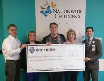 Check presented to Dr. Jacqueline Wynn, PHD (2nd from left), at Nationwide Children’s Hospital Autism Center, Columbus, OH.