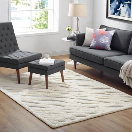 Pictured above is Modway&#39;s Current Abstract Wavy Striped 8X10 Shag Area Rug in ivory.