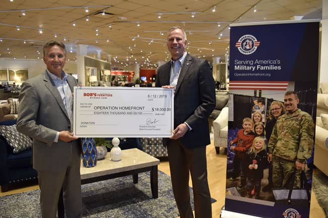 Pictured during Bob’s check presentation to Operation Homefront (left to right): Mike Skirvin, CEO of Bob’s Discount Furniture, and Brig. Gen. (ret.) John I. Pray Jr., president and CEO of Operation Homefront.