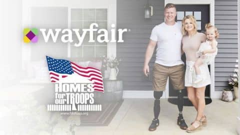 Marine Lance Corporal John Curtin and his family outside their new home built by Homes For Our Troops and furnished by Wayfair. (Photo: Business Wire)