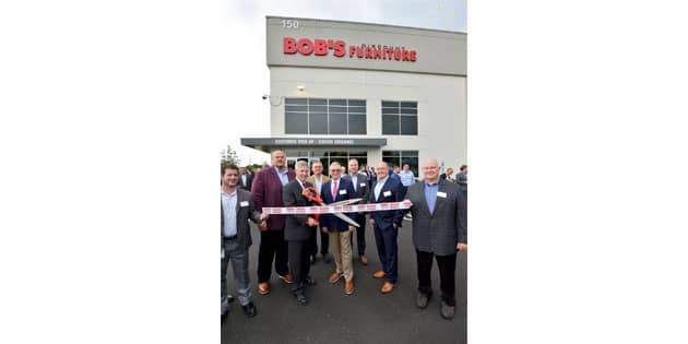 Piscataway Mayor Brian Wahler is joined by members of Bob’s Discount Furniture President and CEO Bill Barton at the official ribbon cutting ceremony in Piscataway, New Jersey.