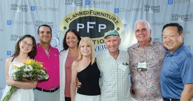 Pictured left to right: Caitlin Herron, Cancer survivor, Mickey and Alex Justice of Coaster, Peggy Hester, Rick Powell, Roy Hester and Doctor Edward Kim.