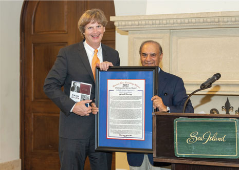 Gat Caperton, CEO of Gat Creek in Berkeley Springs, W.V., (left) received AHFA’s Distinguished Service Award in November. Farooq Kathwari, Chairman, CEO and President of Ethan Allen, presented the honor. 