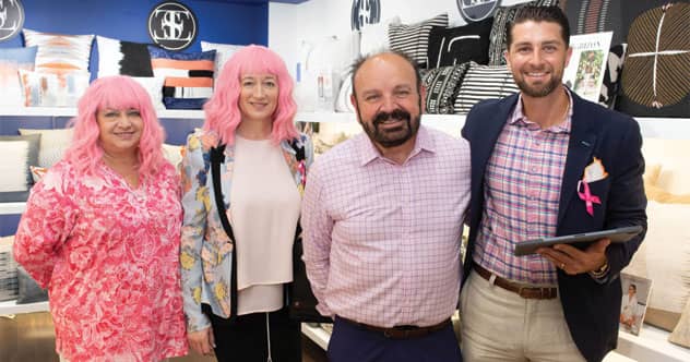 Participating in ICFA’s “Pink Out” activity during Casual Market Chicago in July were Angela Kolb and Elaine Smith, Elaine Smith Inc.; Eli Hymer, Gasper Home &amp; Garden Showplace; and Zachary Hertlein, Elaine Smith.